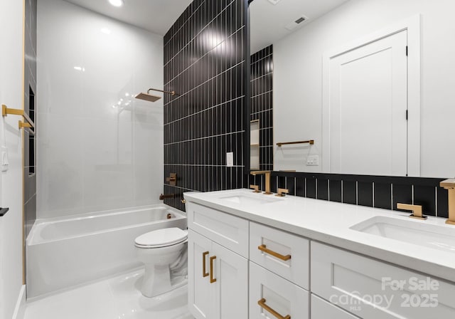 1626 Burtonwood Cir, Charlotte, NC 28212 - full bath with double vanity, washtub / shower combination, and recessed lighting