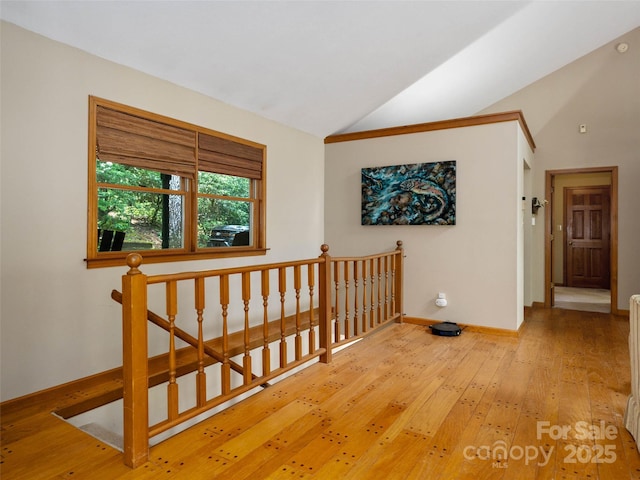 1396 W Christy Trl, Sapphire, NC 28774 - hallway with an upstairs landing, lofted ceiling, and hardwood / wood-style floors