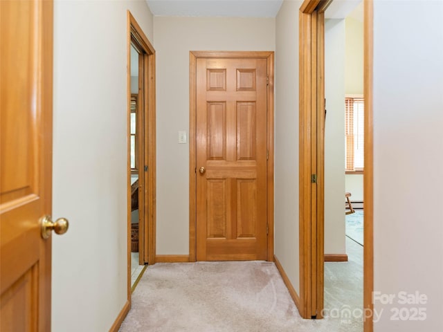 1396 W Christy Trl, Sapphire, NC 28774 - corridor featuring light carpet and a baseboard heating unit