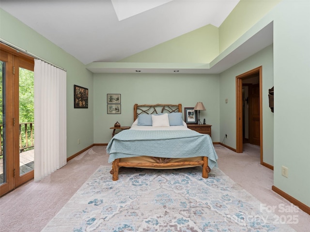 1396 W Christy Trl, Sapphire, NC 28774 - bedroom featuring light colored carpet, access to exterior, lofted ceiling, and a skylight