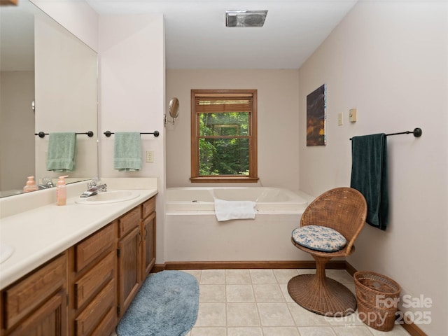 1396 W Christy Trl, Sapphire, NC 28774 - bathroom featuring a garden tub, double vanity, and tile patterned floors