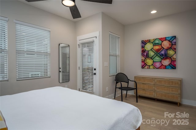 2011 Hamorton Pl, Charlotte, NC 28205 - bedroom featuring access to exterior, wood finished floors, baseboards, a ceiling fan, and recessed lighting