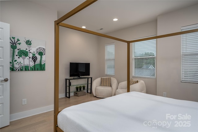 2011 Hamorton Pl, Charlotte, NC 28205 - bedroom with light wood-style flooring, recessed lighting, and baseboards