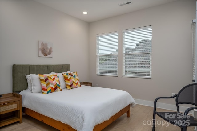 2011 Hamorton Pl, Charlotte, NC 28205 - bedroom with light wood-style flooring, baseboards, and recessed lighting