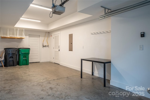 2011 Hamorton Pl, Charlotte, NC 28205 - garage featuring a garage door opener, electric panel, and baseboards