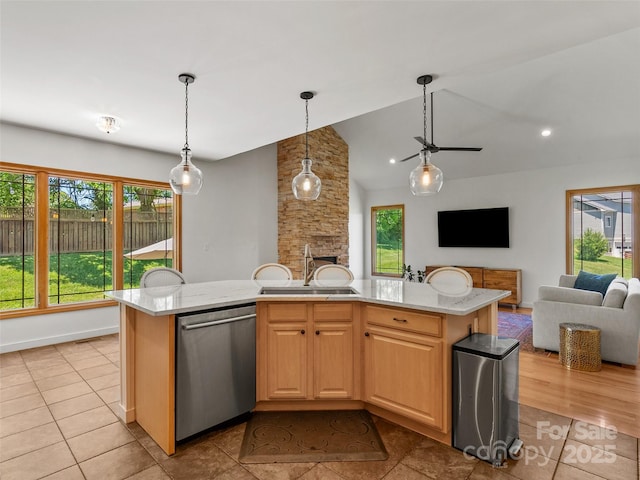 15 Carl Roberts Rd, Alexander, NC 28701 - kitchen featuring dishwasher, light tile patterned flooring, a sink, open floor plan, and healthy amount of natural light
