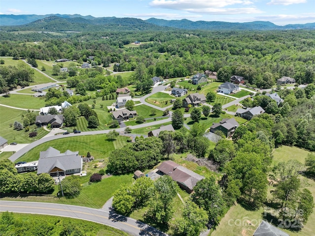 15 Carl Roberts Rd, Alexander, NC 28701 - aerial perspective of suburban area featuring a forest and mountains