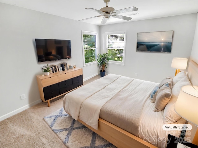 8803 Sweetwater Pl, Waxhaw, NC 28173 - carpeted bedroom featuring baseboards and a ceiling fan