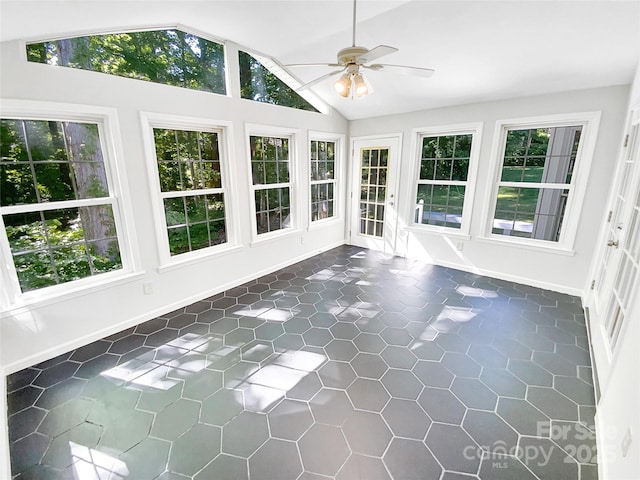 8803 Sweetwater Pl, Waxhaw, NC 28173 - unfurnished sunroom with lofted ceiling, plenty of natural light, baseboards, and tile patterned flooring