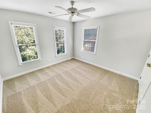 8803 Sweetwater Pl, Waxhaw, NC 28173 - carpeted spare room featuring baseboards and a ceiling fan