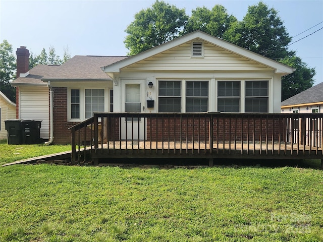 76 Sumner Ave NW, Concord, NC 28027 - rear view of house featuring a deck, a chimney, and a yard