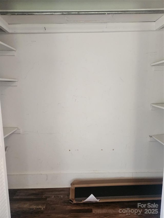 76 Sumner Ave NW, Concord, NC 28027 - spacious closet with wood finished floors