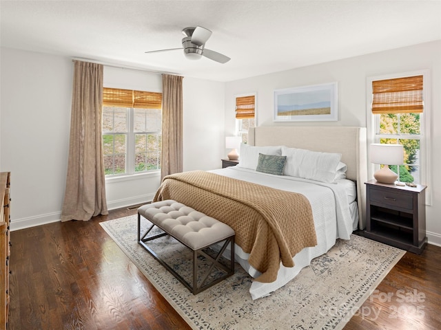 8 Rose Briar Cir, Weaverville, NC 28787 - bedroom with multiple windows, baseboards, dark wood-style flooring, and ceiling fan