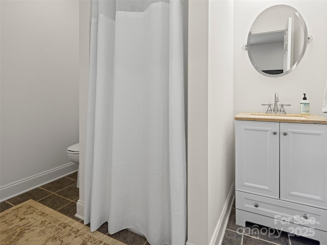 8 Rose Briar Cir, Weaverville, NC 28787 - bathroom with vanity, toilet, tile patterned flooring, baseboards, and a shower with shower curtain