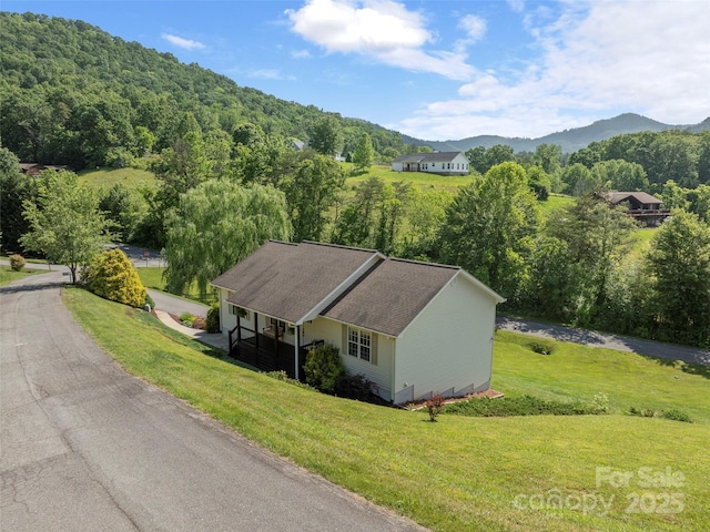 8 Rose Briar Cir, Weaverville, NC 28787 - view of mountain backdrop with a heavily wooded area