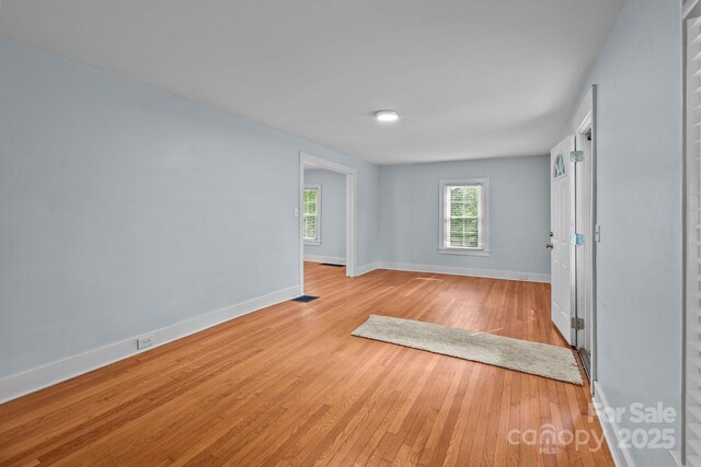 310 S Spencer Ave, Spencer, NC 28159 - spare room featuring hardwood / wood-style floors and baseboards