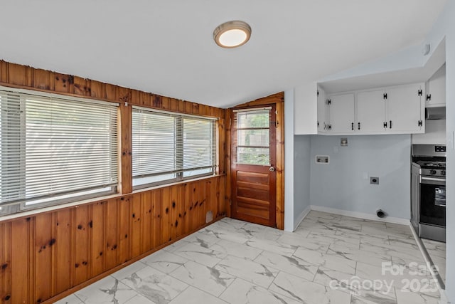 310 S Spencer Ave, Spencer, NC 28159 - laundry area with hookup for an electric dryer, light marble finish floors, hookup for a washing machine, wooden walls, and cabinet space