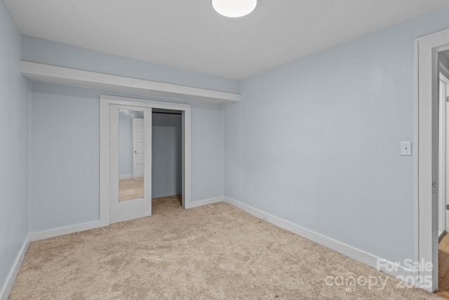 310 S Spencer Ave, Spencer, NC 28159 - unfurnished bedroom with carpet floors and a closet