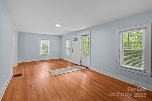 310 S Spencer Ave, Spencer, NC 28159 - foyer entrance with baseboards and light wood-type flooring
