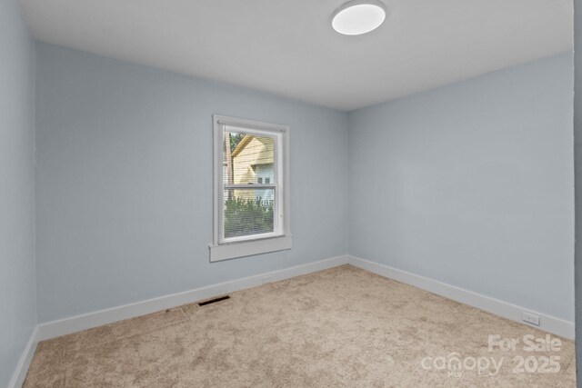 310 S Spencer Ave, Spencer, NC 28159 - carpeted empty room featuring baseboards