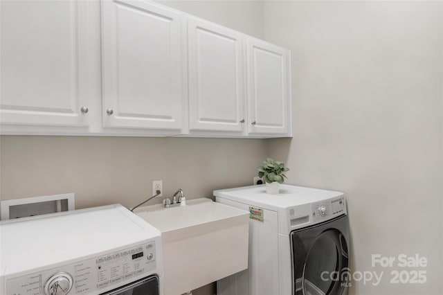 8725 Soaring Eagle Ln, Waxhaw, NC 28173 - laundry room with washing machine and clothes dryer and cabinet space
