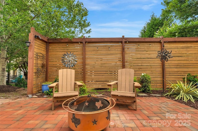 8725 Soaring Eagle Ln, Waxhaw, NC 28173 - view of patio / terrace featuring an outdoor fire pit