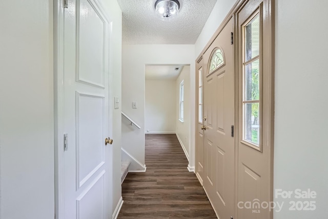 6221 Round Hill Rd, Charlotte, NC 28211 - foyer featuring dark wood-type flooring and a textured ceiling