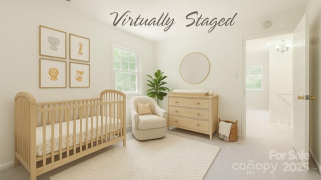 6221 Round Hill Rd, Charlotte, NC 28211 - carpeted bedroom with a crib and baseboards