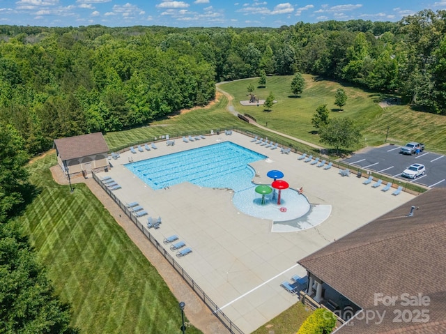 1812 Sutter Creek Dr, Waxhaw, NC 28173 - community pool featuring a wooded view