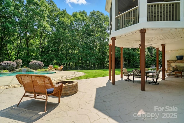 167 Logan Crossing Dr, Davidson, NC 28036 - view of patio with an outdoor fire pit and an outdoor pool