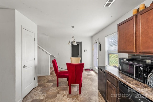 9612 Old Dowd Rd, Charlotte, NC 28214 - dining area featuring stairs and baseboards