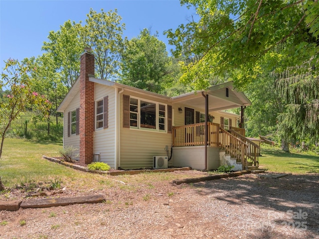 292 Cook Rd, Canton, NC 28716 - view of front of house featuring a chimney, a porch, and cooling unit