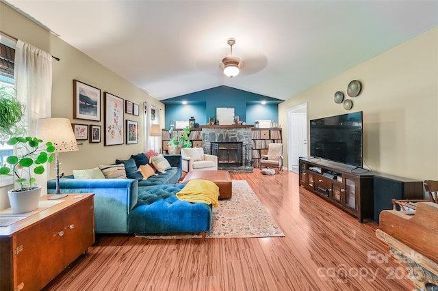 98 Driftwood Ln Unit 7, Mills River, NC 28759 - living area featuring ceiling fan, wood finished floors, vaulted ceiling, and a fireplace