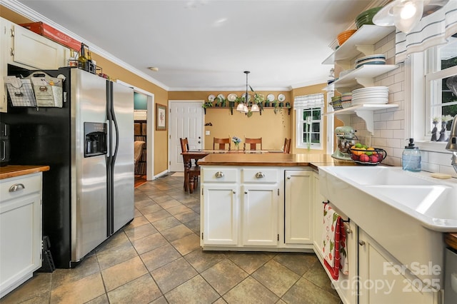 98 Driftwood Ln Unit 7, Mills River, NC 28759 - kitchen with stainless steel fridge with ice dispenser, open shelves, a peninsula, white cabinets, and crown molding