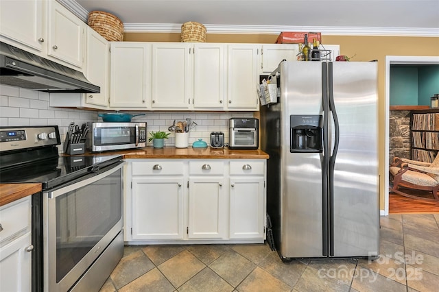 98 Driftwood Ln Unit 7, Mills River, NC 28759 - kitchen featuring appliances with stainless steel finishes, range hood, butcher block counters, tasteful backsplash, and white cabinetry