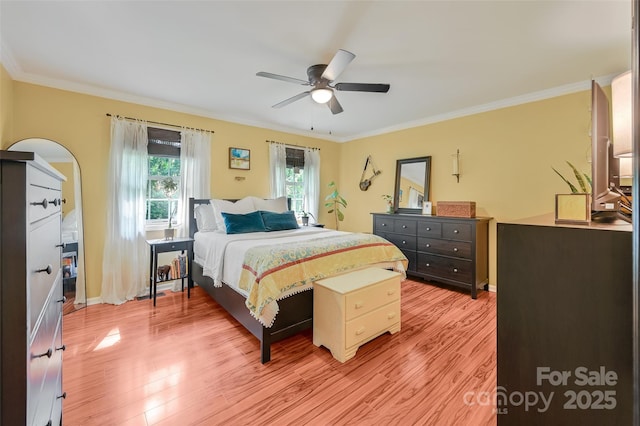 98 Driftwood Ln Unit 7, Mills River, NC 28759 - bedroom with light wood-style floors, crown molding, ceiling fan, and baseboards