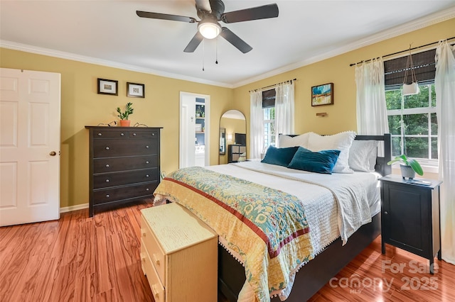 98 Driftwood Ln Unit 7, Mills River, NC 28759 - bedroom featuring wood finished floors, crown molding, baseboards, and a ceiling fan