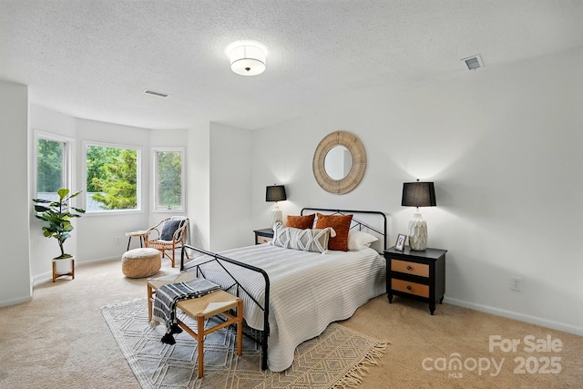 1035 Wexford Pl NW, Concord, NC 28027 - carpeted bedroom featuring baseboards and a textured ceiling