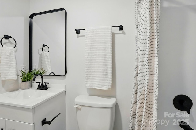 1035 Wexford Pl NW, Concord, NC 28027 - full bathroom featuring vanity, toilet, and curtained shower