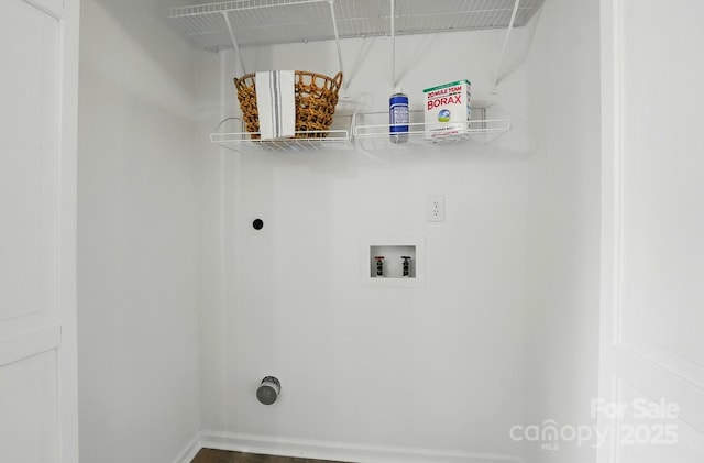 1035 Wexford Pl NW, Concord, NC 28027 - laundry area with hookup for an electric dryer, hookup for a washing machine, and wood finished floors