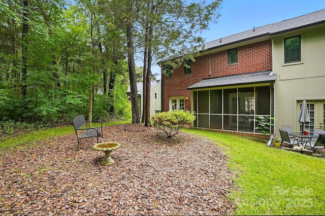 1035 Wexford Pl NW, Concord, NC 28027 - view of grassy yard featuring a sunroom