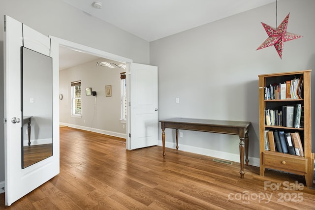 28 Richie St, Asheville, NC 28801 - empty room featuring wood finished floors, baseboards, and a smoke detector