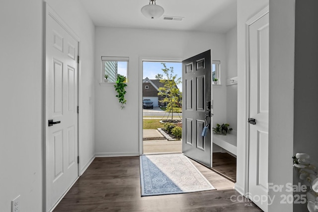 3127 Pinehills Way, Mount Holly, NC 28120 - entryway featuring dark wood-style floors and baseboards