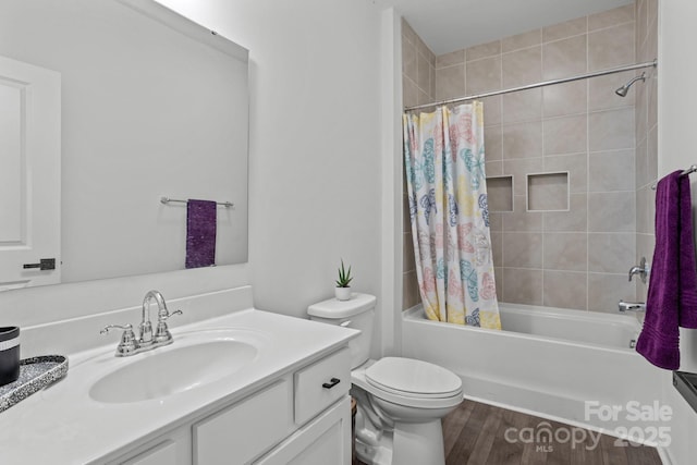 3127 Pinehills Way, Mount Holly, NC 28120 - bathroom featuring vanity, toilet, shower / tub combo with curtain, and wood finished floors