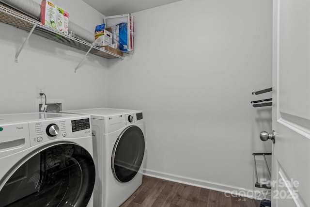 3127 Pinehills Way, Mount Holly, NC 28120 - laundry room with independent washer and dryer, dark wood-style flooring, and baseboards