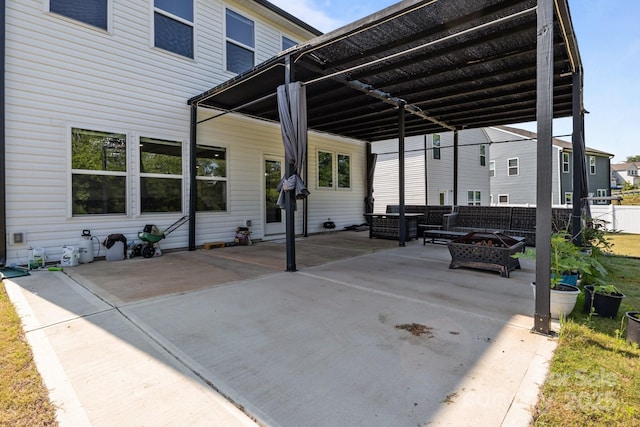 3127 Pinehills Way, Mount Holly, NC 28120 - view of patio with an outdoor fire pit