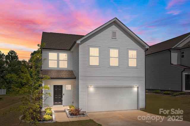 3127 Pinehills Way, Mount Holly, NC 28120 - traditional home with a garage, concrete driveway, and a shingled roof