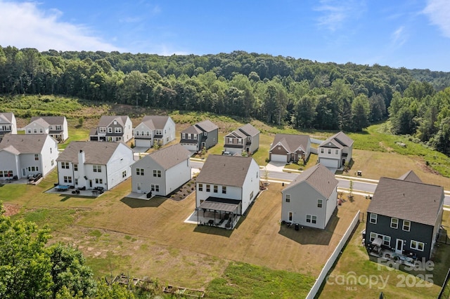 3127 Pinehills Way, Mount Holly, NC 28120 - aerial perspective of suburban area featuring a heavily wooded area