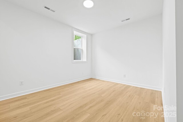 3924 Hager Dr, Charlotte, NC 28208 - spare room with light wood finished floors and baseboards