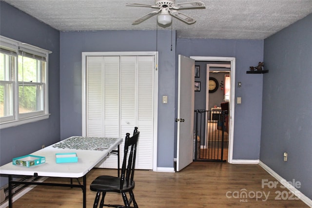 75 Unity Dr, Waynesville, NC 28786 - dining space featuring a textured ceiling, ceiling fan, wood finished floors, and baseboards